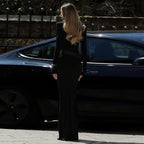 High-neck, fitted, padded-shoulder, long-sleeved, sophisticated dark-toned dress