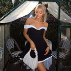 Off-the-shoulder color-blocked design, figure-hugging dress