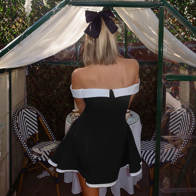 Off-the-shoulder color-blocked design, figure-hugging dress
