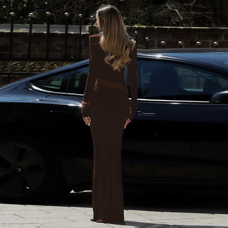High-neck, fitted, padded-shoulder, long-sleeved, sophisticated dark-toned dress