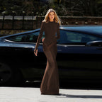 High-neck, fitted, padded-shoulder, long-sleeved, sophisticated dark-toned dress